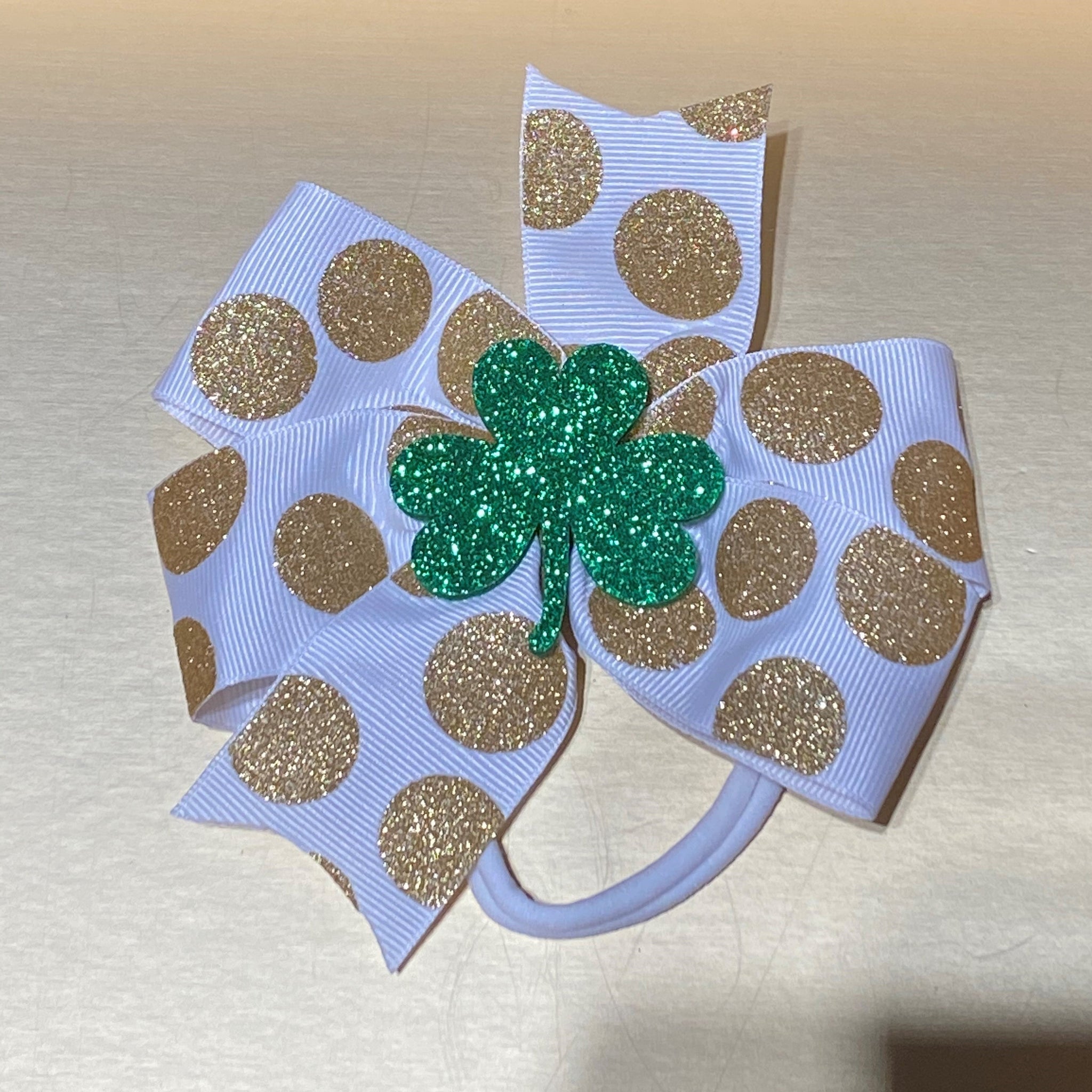 White Bow with Gold Glitter Polka Dots and a Green Glitter Shamrock Headband